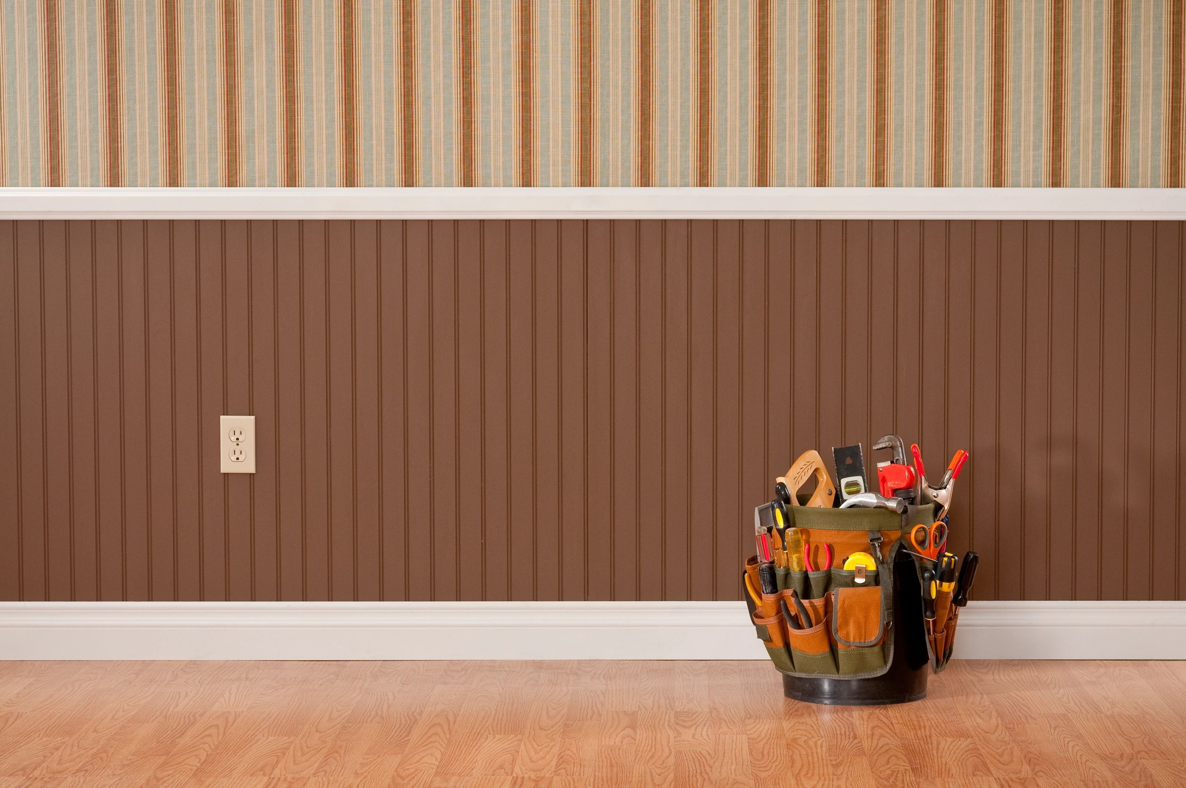 A toolbox next to a brown wall byHoward Carpenter Floor Covering in Danville KY