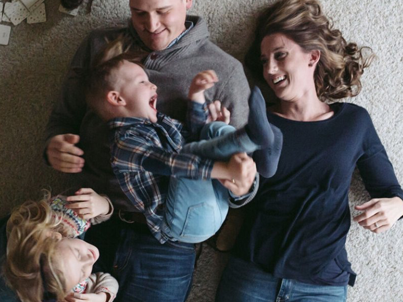 Wells Fargo advert having a happy family as focus in Howard Carpenter Floor Covering in Danville KY