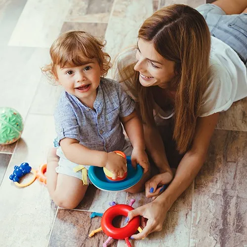 Happy mom with child | Howard-Carpenter Floor Covering