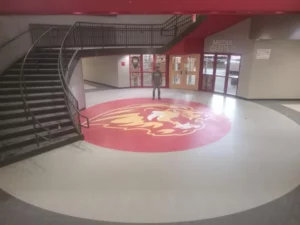 lion logo on floor | Howard-Carpenter Floor Covering