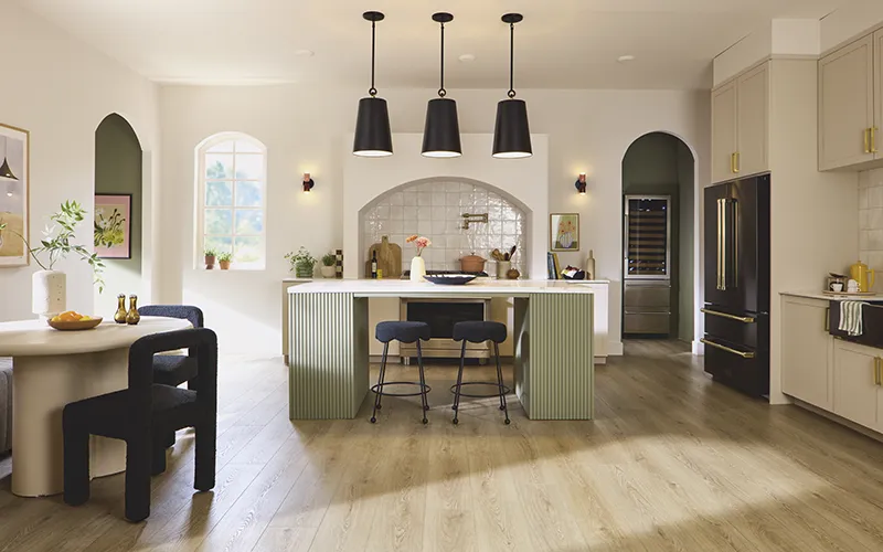 Contemporary Kitchen Space with vinyl floors, green cabinets | Howard-Carpenter Floor Covering